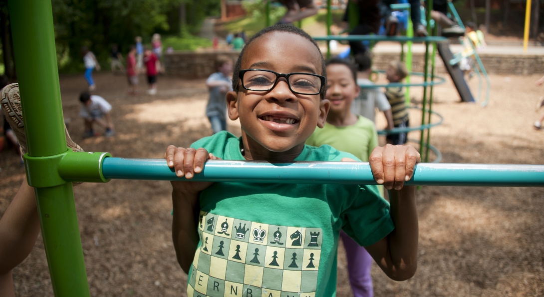 Happy children playing on playground