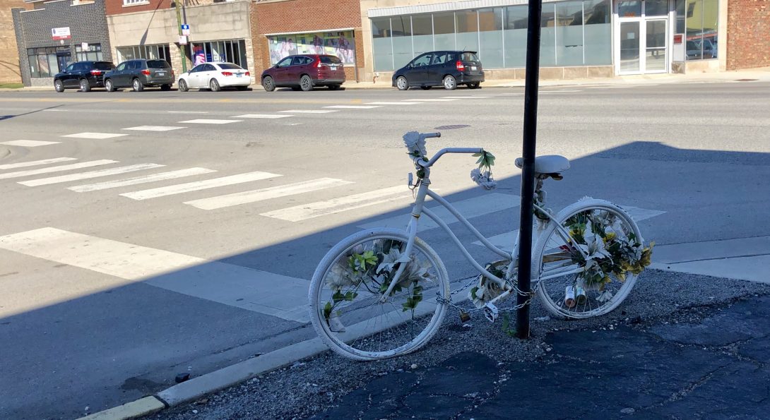 ghost bike dedicated to Lisa Shalk, who was killed by a driver while riding her bike at the intersection of Archer Avenue and Lorel Avenue in November 2017
