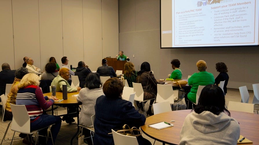 Louise McCurry gives a presentation to the audience at the 2019 Park Advisory Council Conference