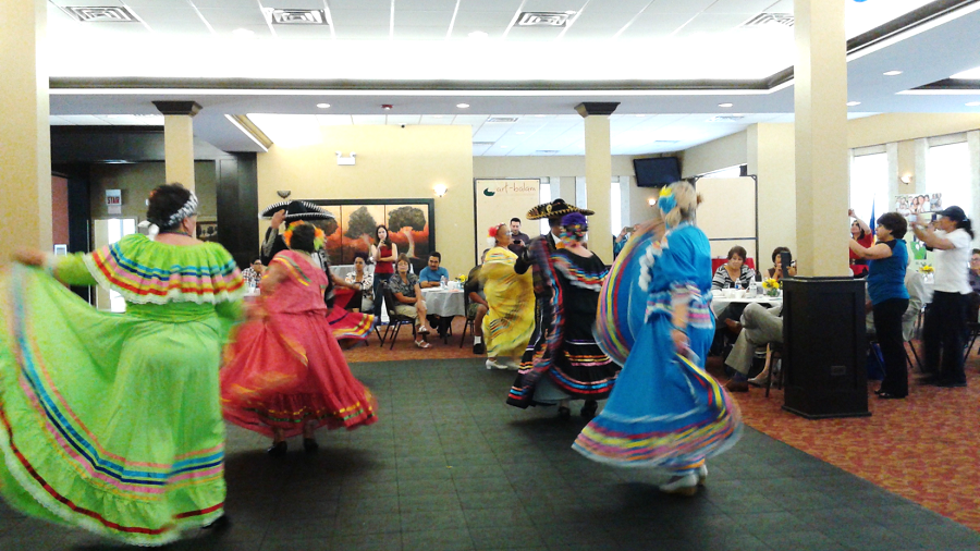 Pilsen Senior Center residents engage in traditional folk dancing.