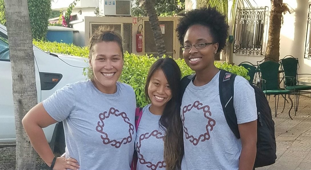 Allison Delgado poses with teammates in Senegal